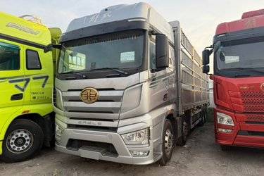 二手一汽解放 J7重卡 经典版 460马力 8X4 9.4米仓栅式载货车(国六) 前四后八 锡柴二手载货车 黄牌图片