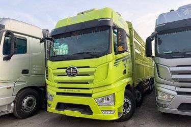 二手一汽解放 J7重卡 经典版 460马力 8X4 9.4米仓栅式载货车(国六) 前四后八 锡柴二手载货车 黄牌图片