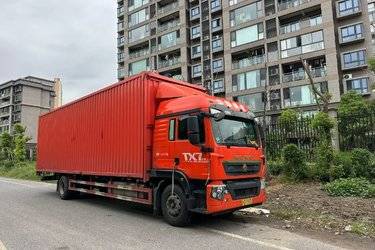 二手中国重汽 HOWO TX7 270马力 4X2 9.52米翼开启厢式载货车(国六) 单桥 曼二手载货车 黄牌图片