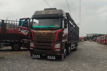 二手青岛解放 JH6重卡 430马力 8X4 9.5米仓栅式载货车(国五) 前四后八 潍柴二手载货车 黄牌图片