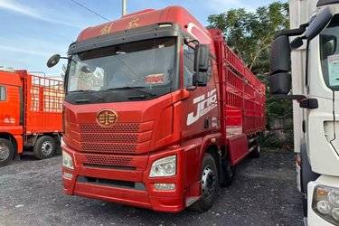 二手青岛解放 JH6重卡 领航版2.0 350马力 8X2 9.5米仓栅式载货车(国六) 前四后六 锡柴二手载货车 黄牌图片