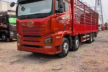 二手青岛解放 JH6重卡 460马力 8X4 9.4米仓栅式载货车(国五) 前四后八 锡柴二手载货车 黄牌图片