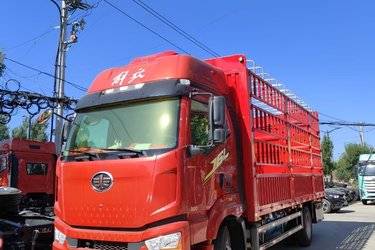 二手一汽解放J6L 精英版 7.8L柴油 320马力 4X2 法士特8档 高顶 6.75米排半仓栅式载货车(国六) 单桥 大柴二手载货车 黄牌图片