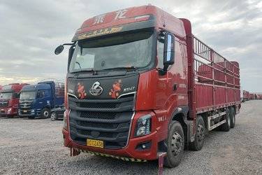 二手东风柳汽 乘龙H7重卡 460马力 8X4 9.4米仓栅式载货车(国五) 前四后八 潍柴二手载货车 黄牌图片