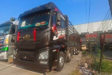 二手青岛解放 JH6重卡 领航版2.0 400马力 8X4 9.4米仓栅式载货车(法士特12挡)(国五) 前四后八 潍柴二手载货车 黄牌