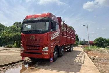 二手青岛解放 JH6重卡 领航版2.0 460马力 8X4 9.4米仓栅式载货车(国五) 前四后八 锡柴二手载货车 黄牌