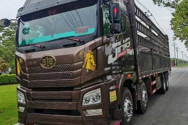二手青岛解放 JH6重卡 领航版2.0 460马力 8X4 9.4米仓栅式载货车(国五) 前四后八 锡柴二手载货车 黄牌
