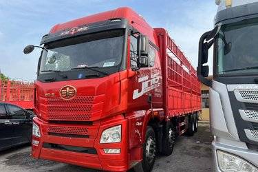 二手青岛解放 JH6重卡 领航版2.0 420马力 8X4 9.5米仓栅式载货车(国五) 前四后八 锡柴二手载货车 黄牌图片