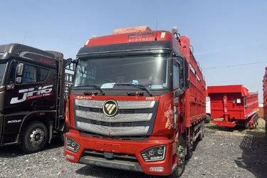 二手福田 欧曼EST 6系重卡 穿越版 460马力 8X4 9.45米仓栅式载货车(国五) 前四后八 福田康明斯二手载货车 黄牌图片