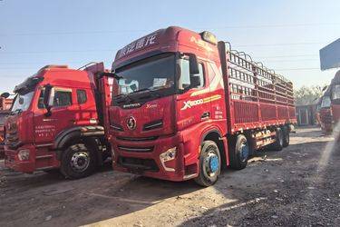 二手陕汽重卡 德龙X6000 经典版 560马力 8X4 9.5米AMT自动档仓栅式载货车(国六) 前四后八 潍柴二手载货车 黄牌图片