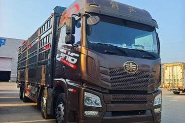 二手青岛解放 JH6重卡 领航版2.0 460马力 8X4 9.4米仓栅式载货车(国六) 前四后八 锡柴二手载货车 黄牌