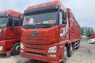 二手青岛解放 JH6重卡 460马力 8X4 9.5米仓栅式载货车(国五) 前四后八 锡柴二手载货车 黄牌