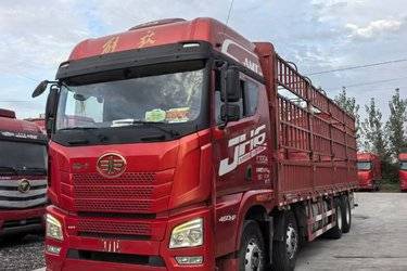 二手青岛解放 JH6重卡 领航版2.0 460马力 8X4 9.4米仓栅式载货车(国六) 前四后八 锡柴二手载货车 黄牌图片