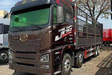 二手青岛解放 JH6重卡 领航版2.0 460马力 8X4 9.4米仓栅式载货车(国六) 前四后八 锡柴二手载货车 黄牌图片