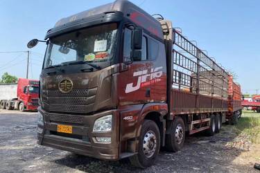 二手青岛解放 JH6重卡 领航版 460马力 8X4 9.5米AMT自动挡栏板载货车(国五) 前四后八 锡柴二手载货车 黄牌图片