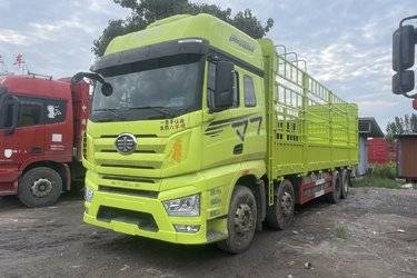 二手一汽解放 J7重卡 经典版 560马力 8X4 9.5米AMT自动档仓栅式载货车(液缓)(国六) 前四后八 锡柴二手载货车 黄牌图片