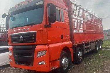 二手中国重汽 汕德卡SITRAK C7H重卡 440马力 8X4 9.52米仓栅式载货车(国五) 前四后八 中国重汽二手载货车 黄牌