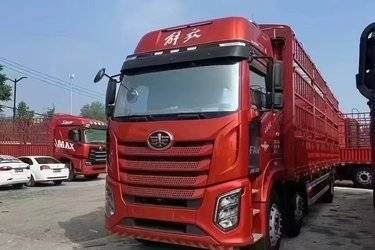 二手一汽解放 J6G 领航版 320马力 6X2 9.7米仓栅式载货车(平顶)(国六) 前四后四 锡柴二手载货车 黄牌图片