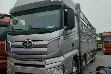 二手一汽解放 J7重卡 460马力 8X4 9.4米仓栅式载货车(国六) 前四后八 锡柴二手载货车 黄牌