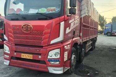 二手青岛解放 JH6重卡 领航版2.0 460马力 8X4 9.4米仓栅式载货车(国六) 前四后八 锡柴二手载货车 黄牌图片