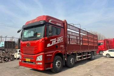 二手青岛解放 JH6重卡 领航版2.0 320马力 6X2 9.5米仓栅式载货车(国六)(8.6L)(F5N前轴)(国六) 前四后四 锡柴二手载货车 黄牌