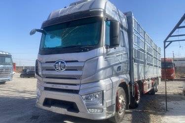 一汽解放 J7重卡 经典版 560马力 8X4 9.4米AMT自动档仓栅式载货车(带液缓)(国六) 前四后八 锡柴二手载货车 黄牌