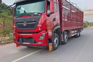 二手东风商用车 天龙KL重卡 465马力 8X4 9.4米仓栅式载货车(国五) 前四后八 东风康明斯二手载货车 黄牌图片