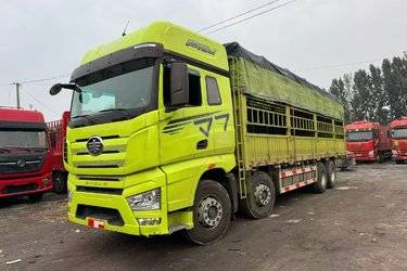 二手一汽解放 J7重卡 460马力 8X4 9.4米仓栅式载货车(国六) 前四后八 锡柴二手载货车 黄牌图片