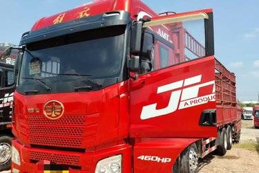 二手青岛解放 JH6重卡 460马力 8X4 9.4米仓栅式载货车(国五) 前四后八 潍柴二手载货车 黄牌图片