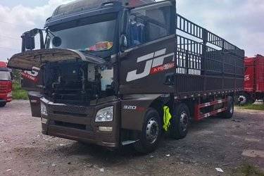 二手青岛解放 JH6重卡 320马力 6X2 9.5米仓栅式载货车(国六) 前四后四 锡柴二手载货车 黄牌