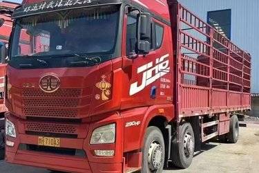 二手青岛解放 JH6重卡 290马力 6X2 9.4米仓栅式载货车(国五) 前四后四 锡柴二手载货车 黄牌