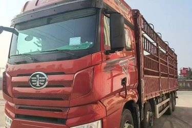 二手一汽解放 J7重卡 460马力 8X4 9.4米仓栅式载货车(国六) 前四后八 锡柴二手载货车 黄牌图片