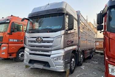 二手一汽解放 J7重卡 经典版 460马力 8X4 9.5米仓栅式载货车(国六) 前四后八 锡柴二手载货车 黄牌图片