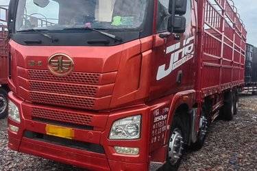 二手青岛解放 JH6重卡 350马力 8X4 9.5米仓栅式载货车(国五) 前四后八 锡柴二手载货车 黄牌