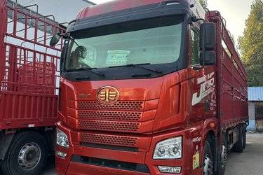 二手青岛解放 JH6重卡 领航版2.0 460马力 8X4 9.4米AMT自动挡仓栅式载货车(国六) 前四后八 锡柴二手载货车 黄牌图片