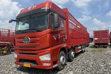 二手一汽解放 J7重卡 460马力 8X4 9.4米仓栅式载货车(国六) 前四后八 锡柴二手载货车 黄牌