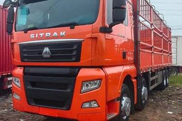 二手中国重汽 汕德卡SITRAK C7H重卡 480马力 8X4 9.52米仓栅式载货车(国五) 前四后八 中国重汽二手载货车 黄牌图片