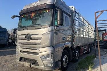 二手一汽解放 J7重卡 经典版 460马力 8X4 9.4米仓栅式载货车(国六) 前四后八 锡柴二手载货车 黄牌图片