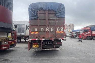 二手东风商用车 天龙KL重卡 465马力 8X4 9.4米仓栅式载货车(国五) 前四后八 安徽康明斯二手载货车 黄牌图片