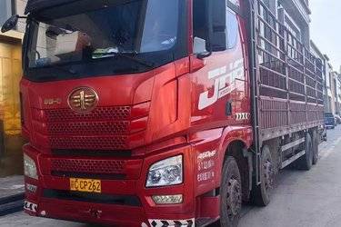 二手青岛解放 JH6重卡 领航版2.0 460马力 8X4 9.4米仓栅式载货车(国五) 前四后八 锡柴二手载货车 黄牌