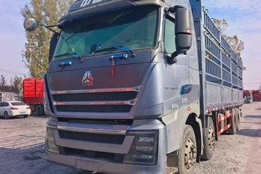 二手中国重汽 HOWO TH7重卡 500马力 8X4 9.3米仓栅式载货车(国六) 前四后八 曼二手载货车 黄牌图片