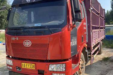 二手一汽解放 J6L中卡 质慧版 180马力 4X2 6.8米仓栅式载货车(国五) 单桥 锡柴二手载货车 黄牌图片