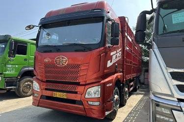 二手青岛解放 JH6重卡 领航版2.0 460马力 8X4 9.5米仓栅式载货车(国六) 前四后八 锡柴二手载货车 黄牌