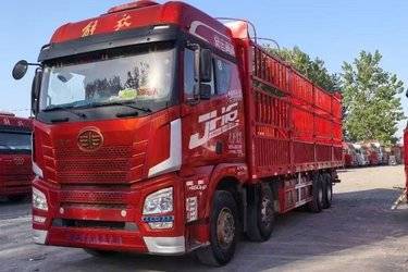 二手青岛解放 JH6重卡 领航版2.0 460马力 8X4 9.4米仓栅式载货车(国六) 前四后八 锡柴二手载货车 黄牌