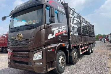 二手青岛解放 JH6重卡 领航版2.0 420马力 8X4 9.4米仓栅式载货车(国五) 前四后八 锡柴二手载货车 黄牌