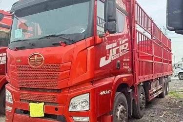 二手青岛解放 JH6重卡 领航版2.0 460马力 8X4 9.4米仓栅式载货车(国六) 前四后八 锡柴二手载货车 黄牌图片