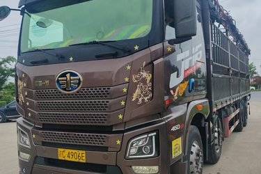 二手青岛解放 JH6重卡 460马力 8X4 9.4米仓栅式载货车(国五) 前四后八 锡柴二手载货车 黄牌图片