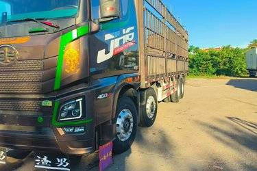 二手青岛解放 JH6重卡 460马力 8X4 9.4米仓栅式载货车(国五) 前四后八 潍柴二手载货车 黄牌图片