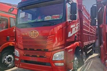 二手青岛解放 JH6重卡 420马力 8X4 9.4米仓栅式载货车(国五) 前四后八 锡柴二手载货车 黄牌