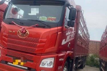 二手青岛解放 JH6重卡 460马力 8X4 9.4米仓栅式载货车(国五) 前四后八 潍柴二手载货车 黄牌图片